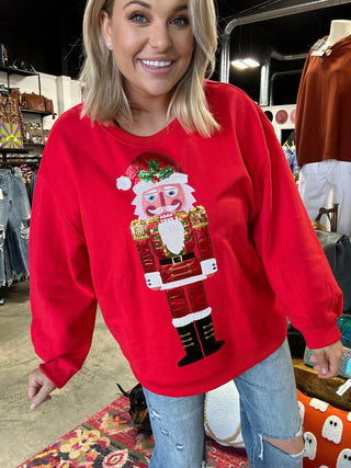 Queen Of Sparkles Red Metalogic Santa Nutcracker Sweatshirt